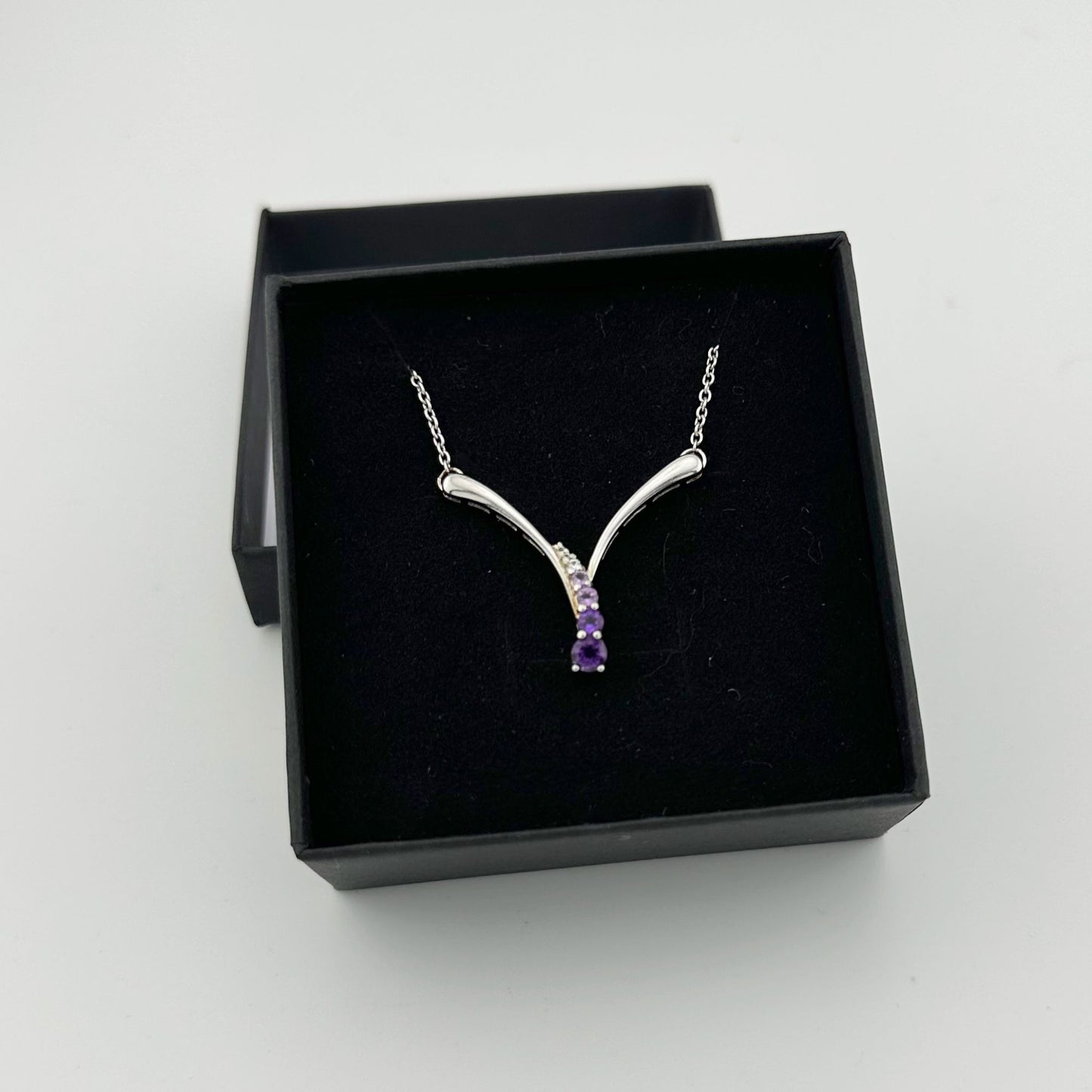 Beautiful African Amethysts graduating in size and color from pink to purples - Sterling Silver - LOVELY!