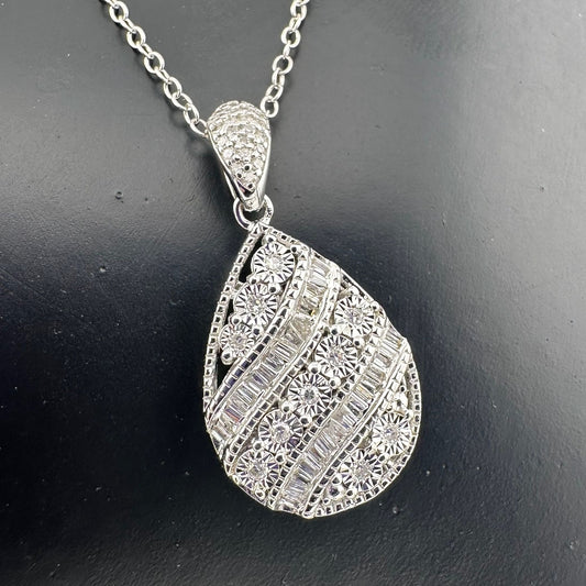 Beautiful Multi Diamond Pendant with 1 Ct of Round and Baguette Diamonds - .925 Stering