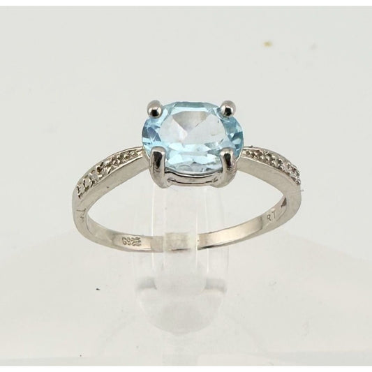 Shimmering Blue Topaz, Oval Cut with Diamond Accent Ring in Sterling Silver - Beautiful!