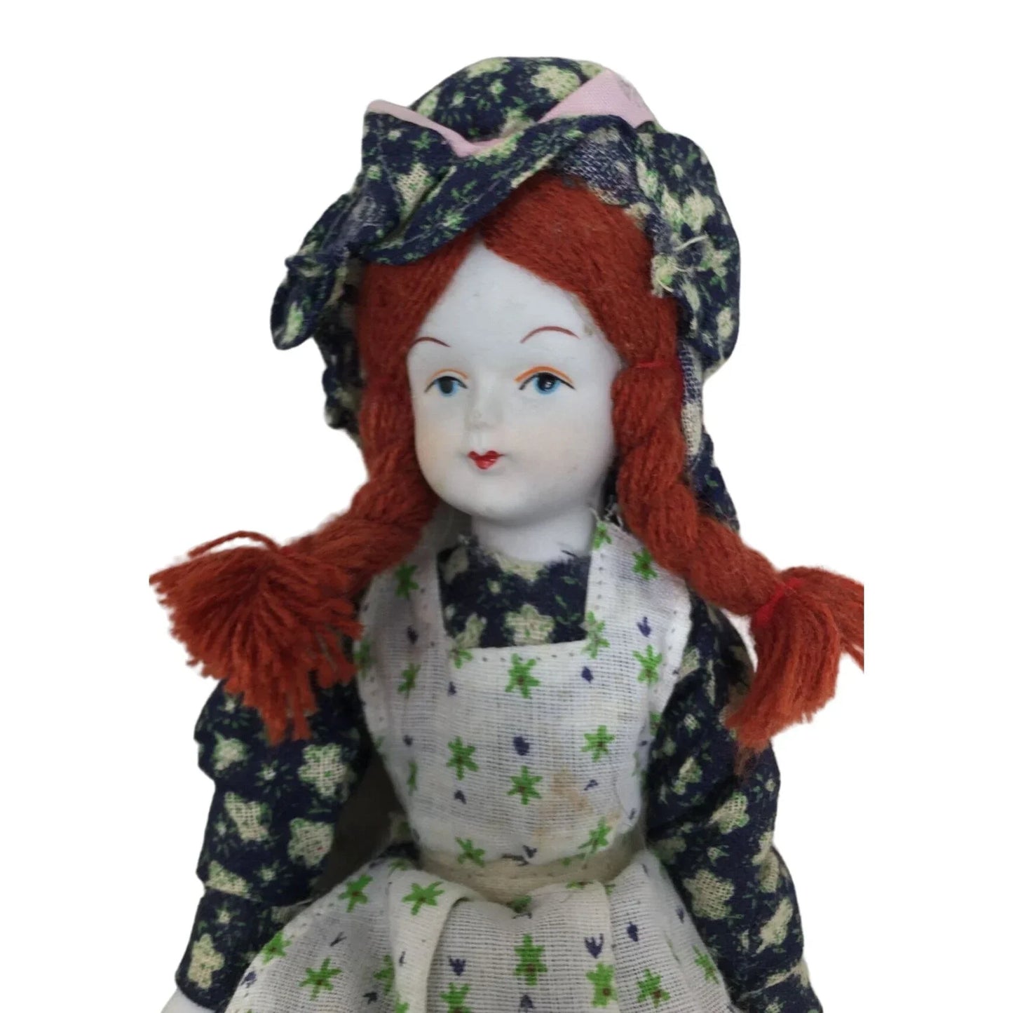 Vintage Porcelain Collectible Doll Wearing Floral Printed Dress With Red Braided Hair, Blue Eyes A+ Stuff A+ Stuff