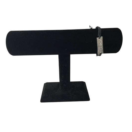 Black Bracelet with Silver Tone Pendant that says ''Music'' in Cursive