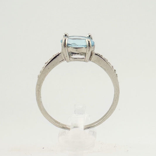 Shimmering Blue Topaz, Oval Cut with Diamond Accent Ring in Sterling Silver - Beautiful!