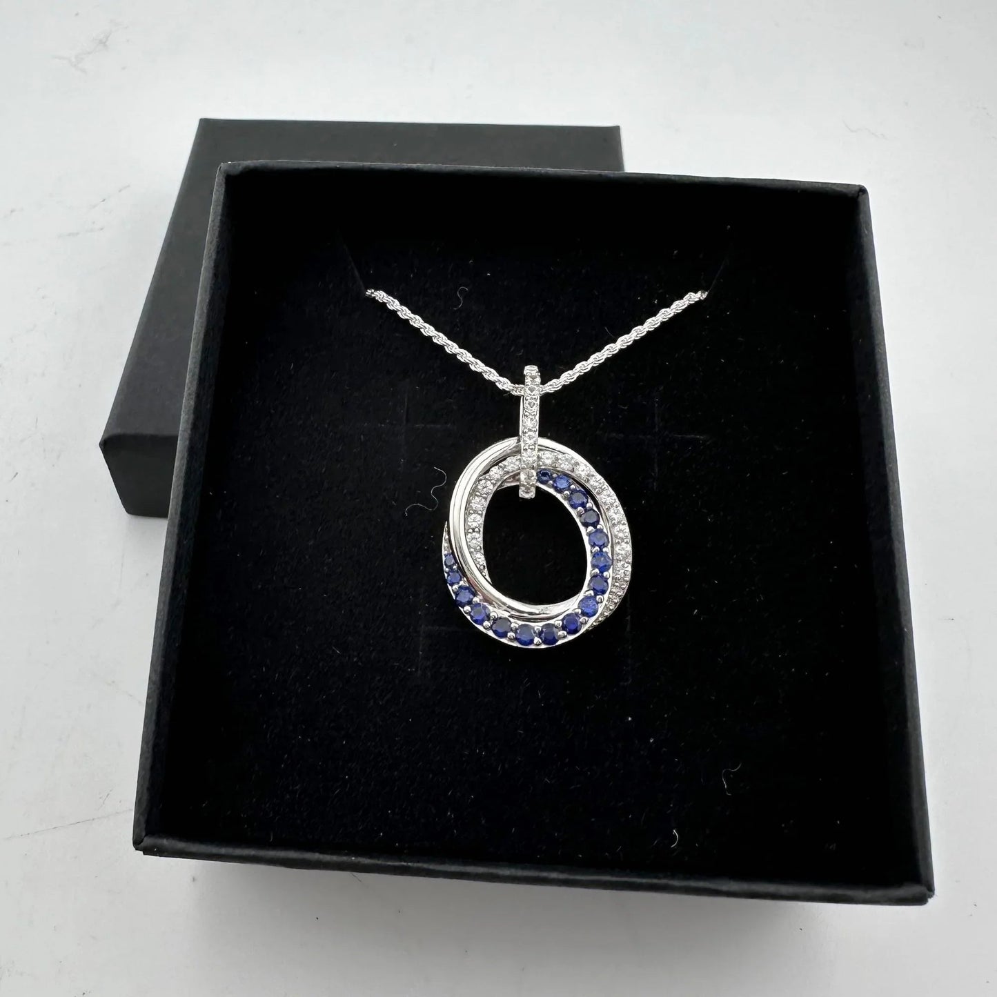 Blue and White Sapphire (Lab Created) Interlocking Loops Pendant with Necklace - A+ Stuff