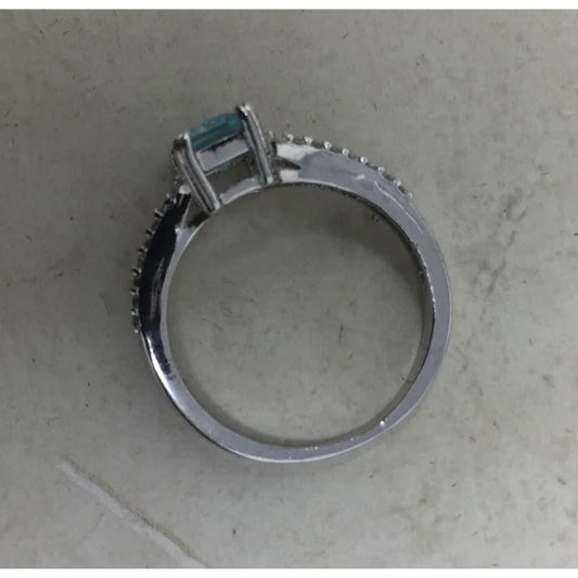 Womens Ring with light blue Gemstone in the Middle/gemstones Around it (No Markings) - A+ Stuff