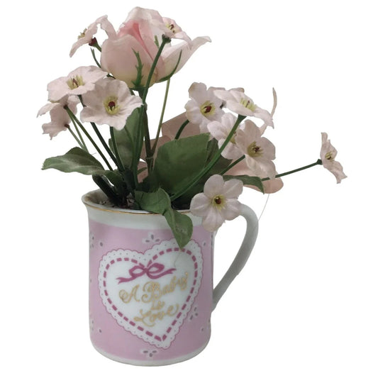 Small Faux Flower Bouquet in Pink Handled Mug that Says "A Baby is Love" A+ Stuff A+ Stuff