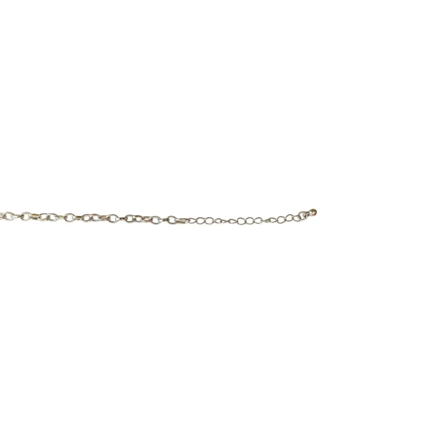Silver chain necklace with round links on a white background