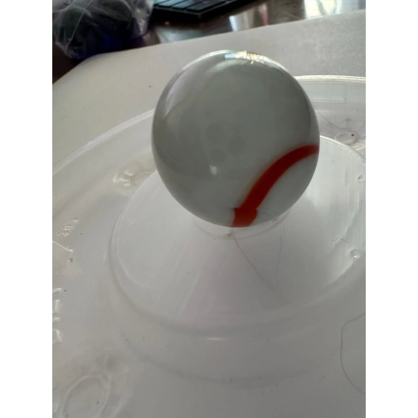 Vintage White Shooter Marbles with Yellow and Orange Swirl Design - A+ Stuff - Collectibles - A+ Stuff