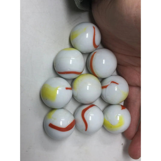 Vintage White Shooter Marbles with Yellow and Orange Swirl Design - A+ Stuff - Collectibles - A+ Stuff