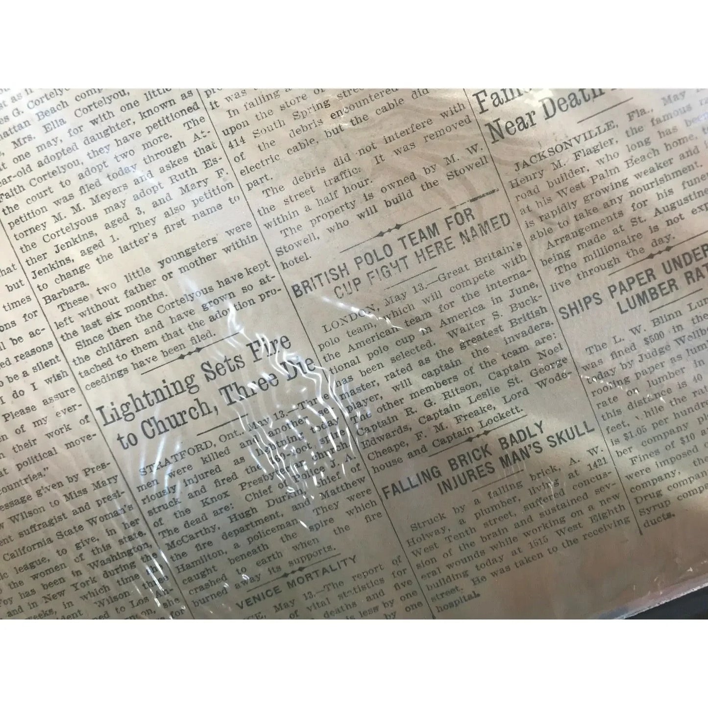 Close-up of vintage newspaper with headlines and aged yellowed paper texture
