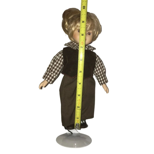 Unmarked porcelain doll - petite with short blonde hair, brown eyes - brown check shirt - brown vest , pants and shoes A+ Stuff A+ Stuff