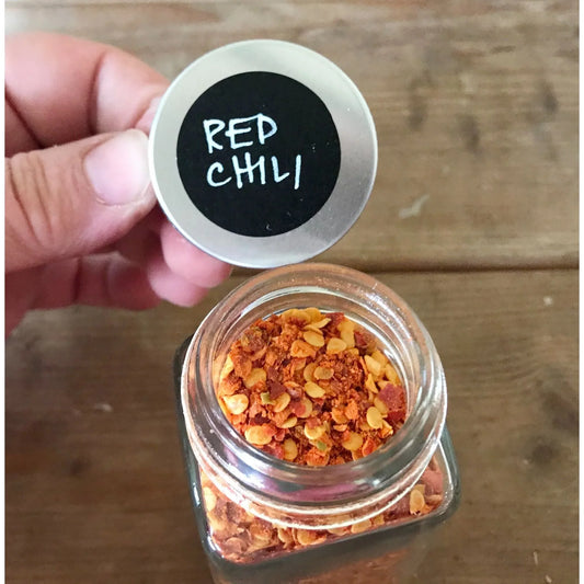 Dried and crushed Red Chili peppers to add a kick! No other ingredients. Carpenter Quality Goods A+ Stuff