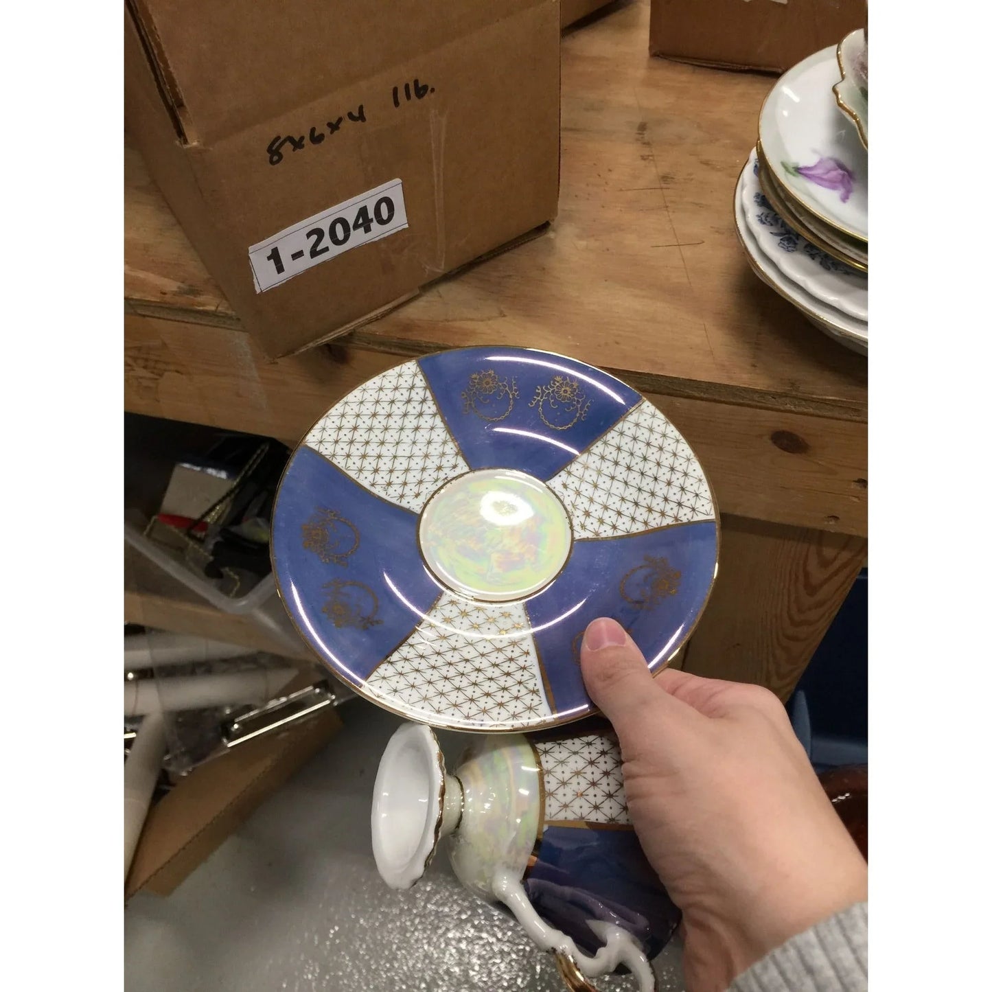 Blue and white Iridescent Teacup and Saucer Set with small gold accent pattern A+ Stuff A+ Stuff