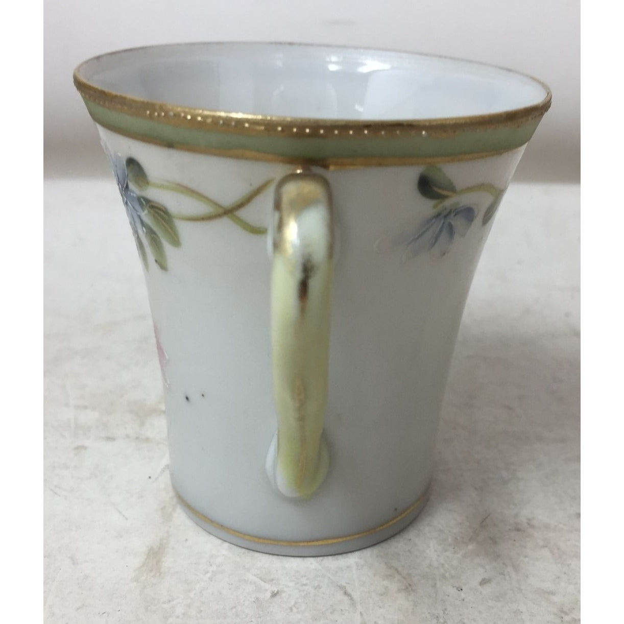 Small Handled Tea Cup with Floral Design and Gold /Green Rim