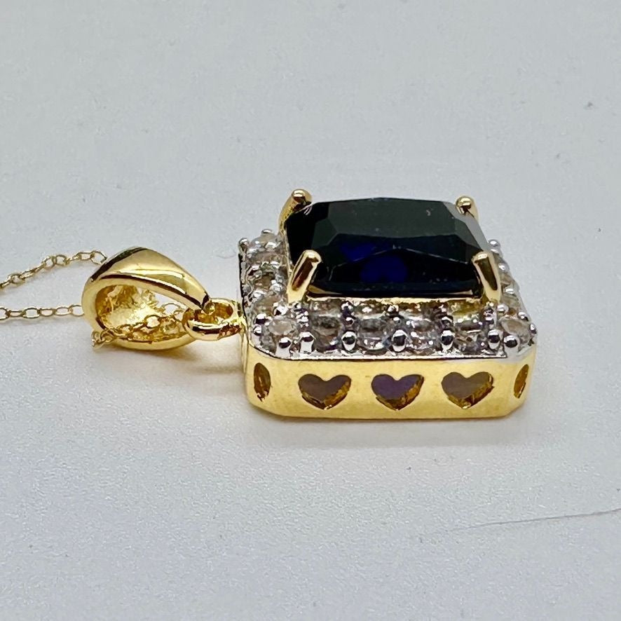 Beautiful 4 Carat Emerald Cut Blue Amethyst Pendant Heart Filagree Pattern Gold Overlay Sterling Silver