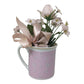 Small Faux Flower Bouquet in Pink Handled Mug that Says "A Baby is Love"