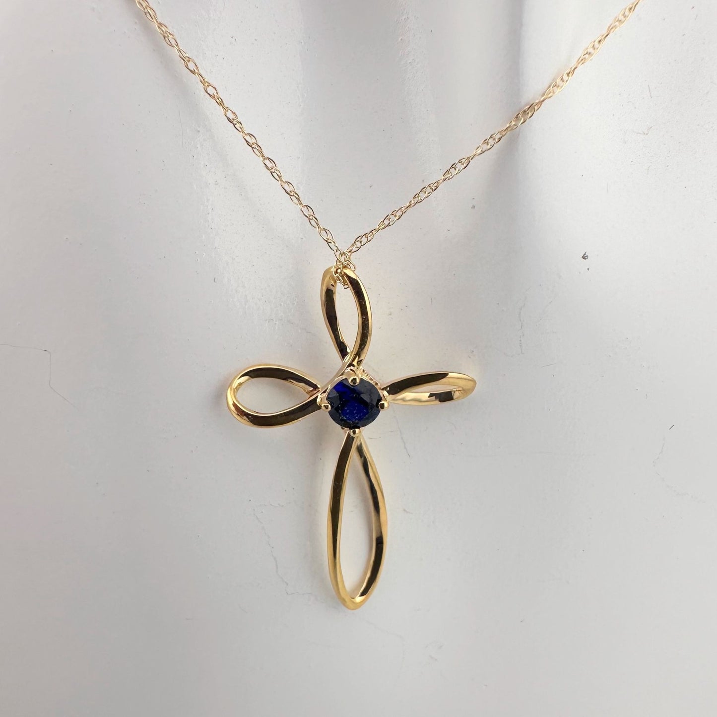 10 Kt Gold Cross Necklace - Deep Blue  Sapphire in Center with 10 Kt Gold Chain