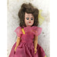 Vintage Collectible Doll Brown Hair, Blue Eyes wearing Pink, Blue, Yellow Dress