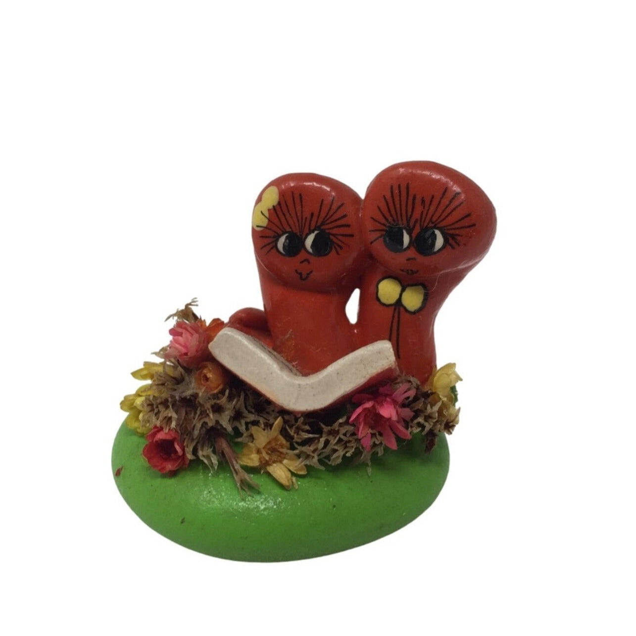 Love Rocks by Maggie Duchess Couple Reading a Love Story Figurine