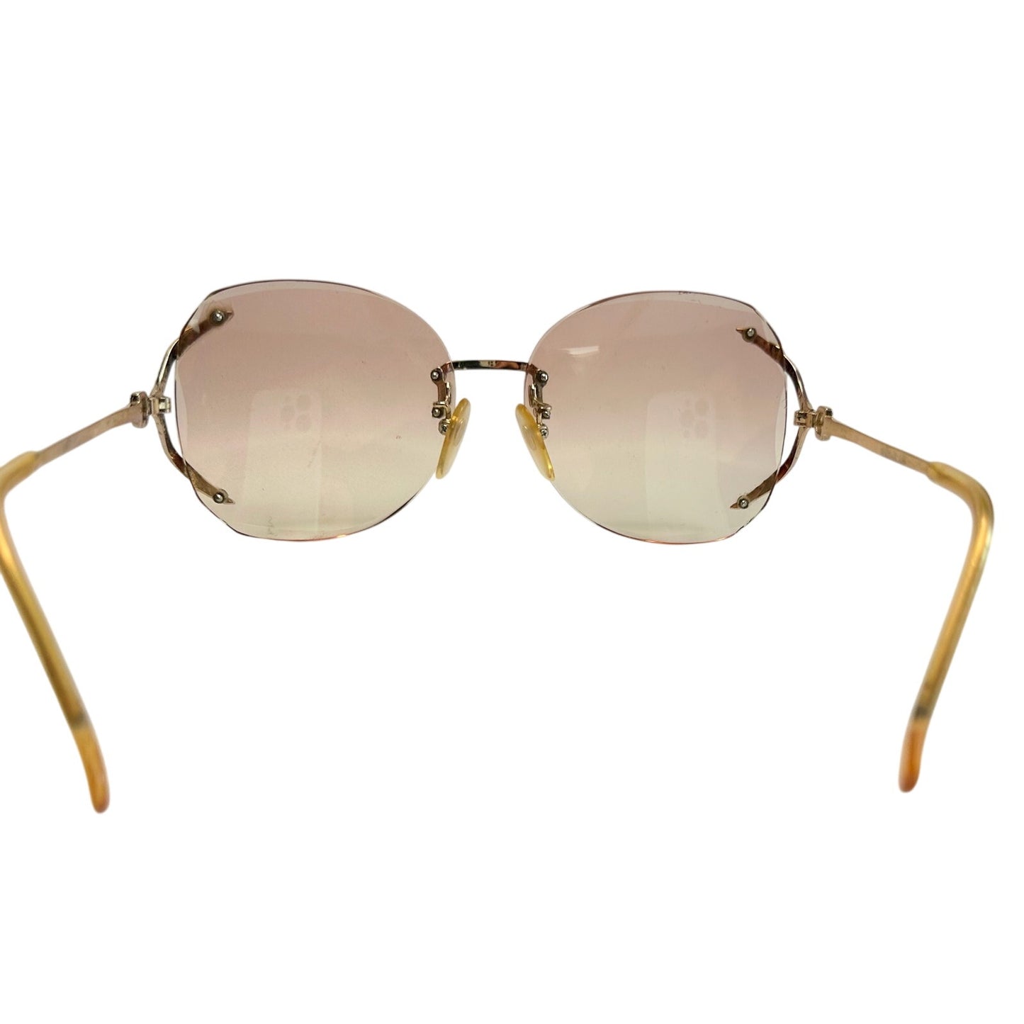 YSL - Yves Saint Laurent Amber / Rose Colored Rimless Sunglasses with Case