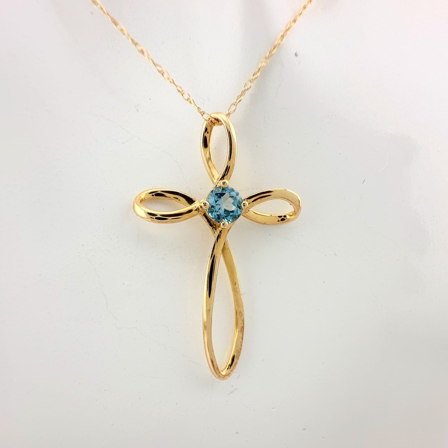 10 Kt Gold Cross Necklace - Beautiful Blue Topaz stone in Center with 10 Kt Gold Chain