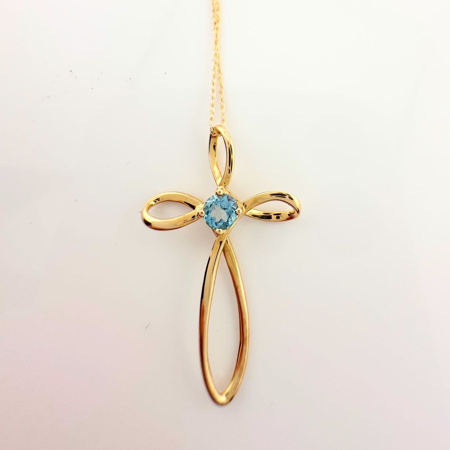 10 Kt Gold Cross Necklace - Beautiful Blue Topaz stone in Center with 10 Kt Gold Chain