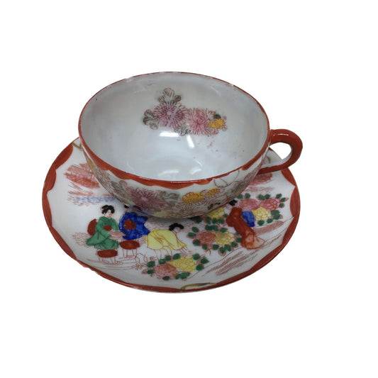 Teacup and Saucer Set with Red Border And flowers printed on both