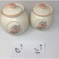 Vintage Pair of Round Lidded Jars With Flower Pattern of the Front