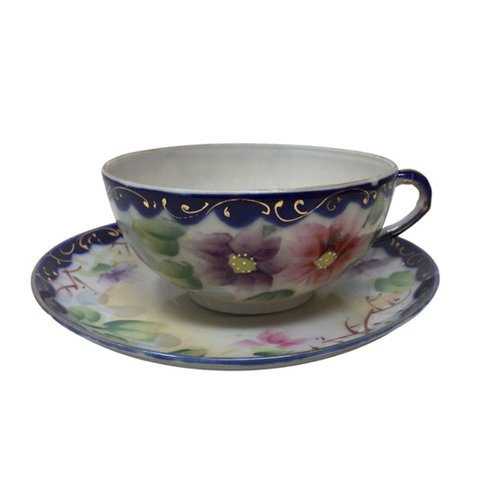 Teacup and Saucer Blue Rimmed Hand Painted Purple and Pink Flowers- Bone China