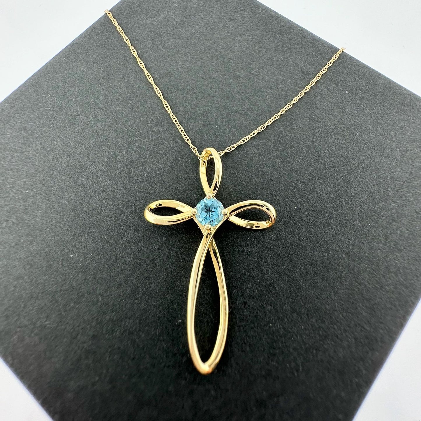 10 Kt Gold Cross Necklace - Beautiful Blue Topaz stone in Center with 10 Kt Gold Chain