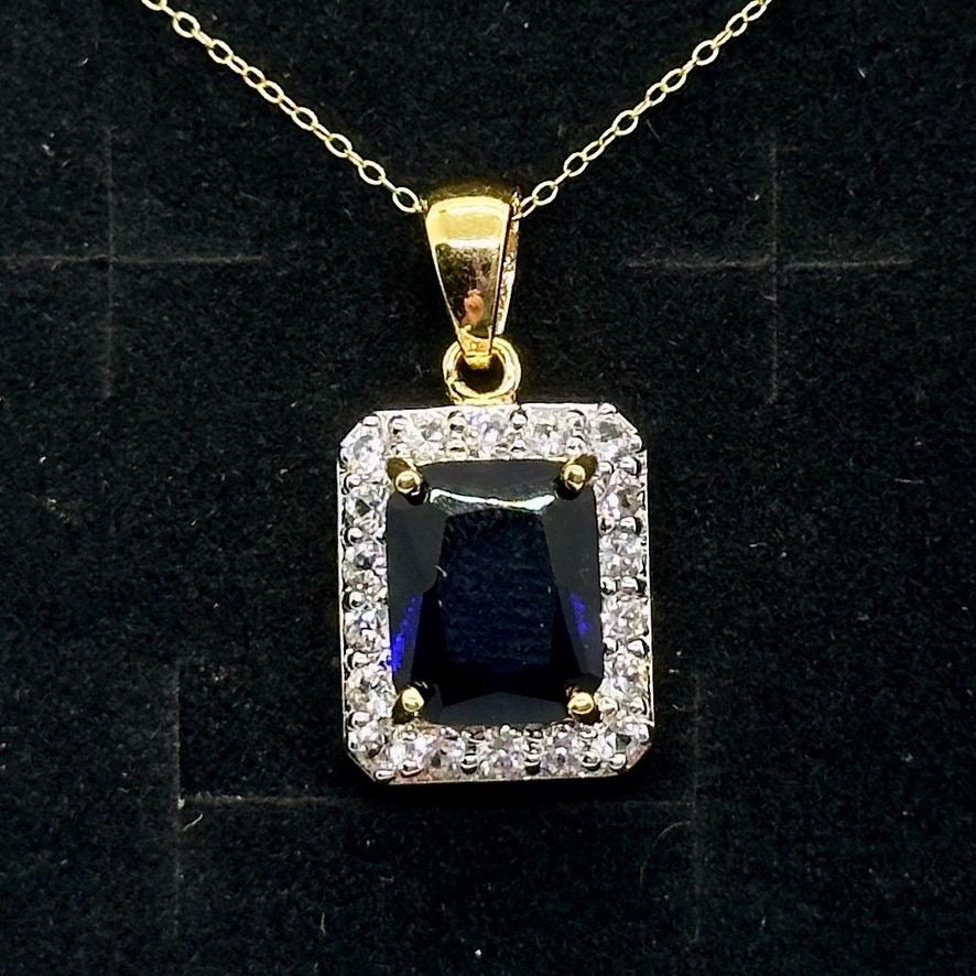 Beautiful 4 Carat Emerald Cut Blue Amethyst Pendant Heart Filagree Pattern Gold Overlay Sterling Silver