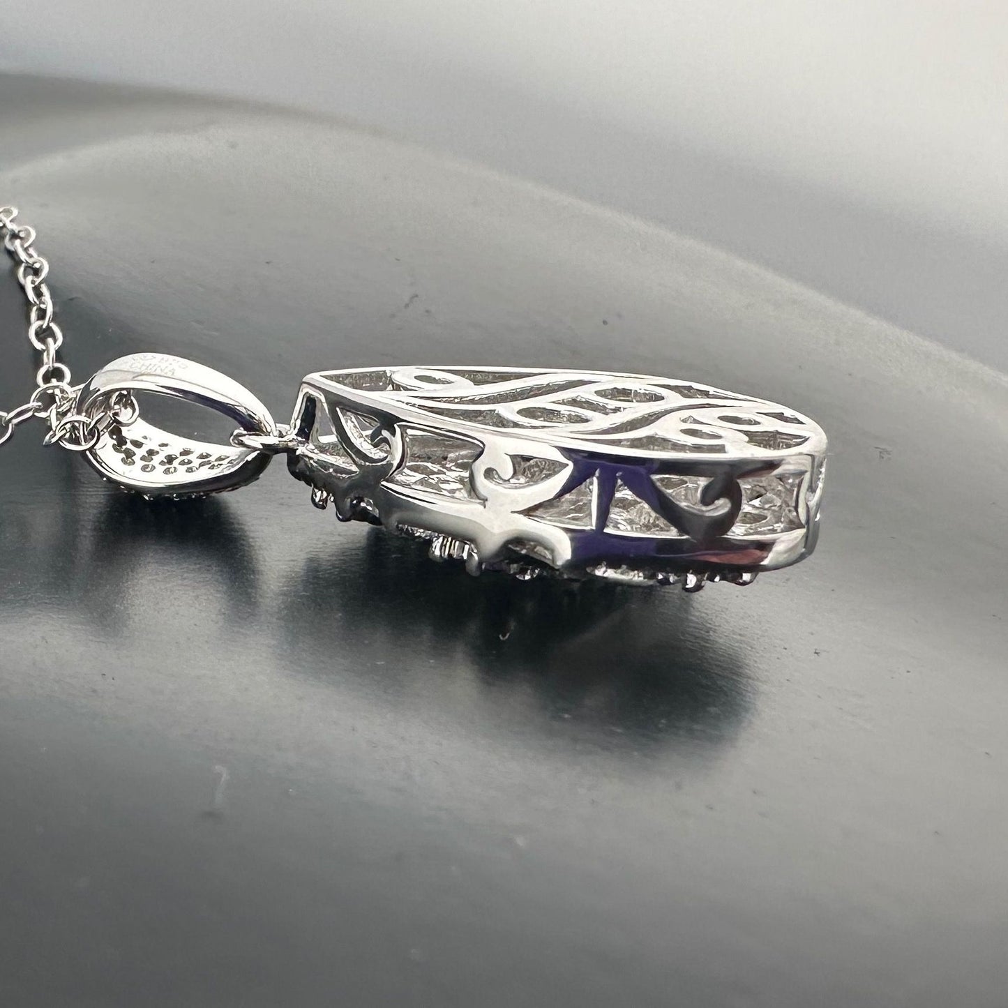 Beautiful Multi Diamond Pendant with 1 Ct of  Round and  Baguette Diamonds - .925 Stering