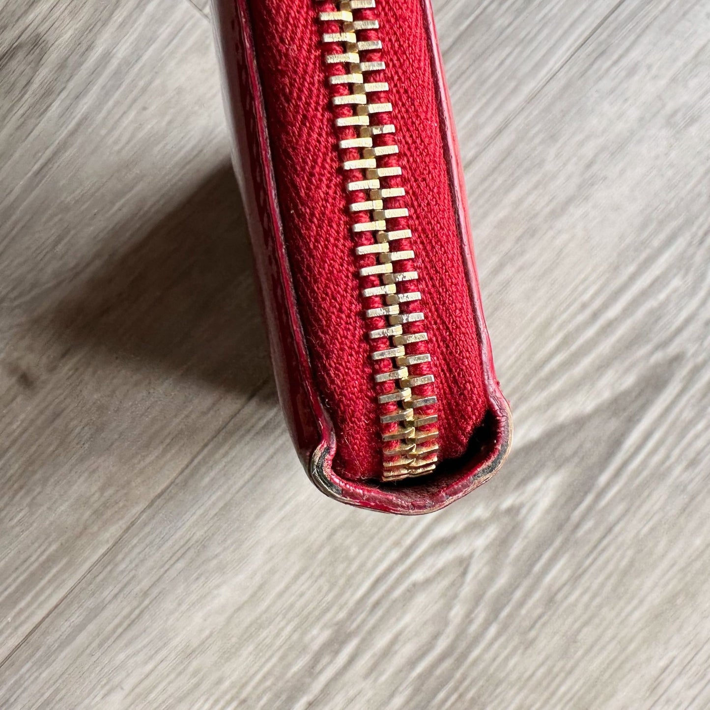 YSL Yves Saint Laurent Red Patent Leather Zippy Wallet