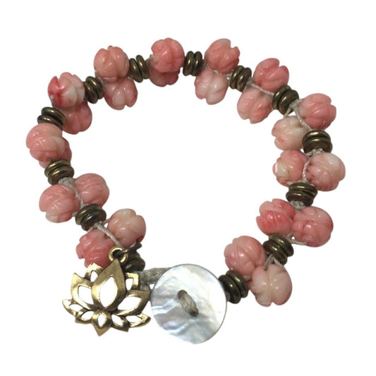 Women's Gold Tone Bracelet with Pink Flowers on it