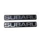 Two Subaru Auto Emblems/Hood Ornaments Silver and Black