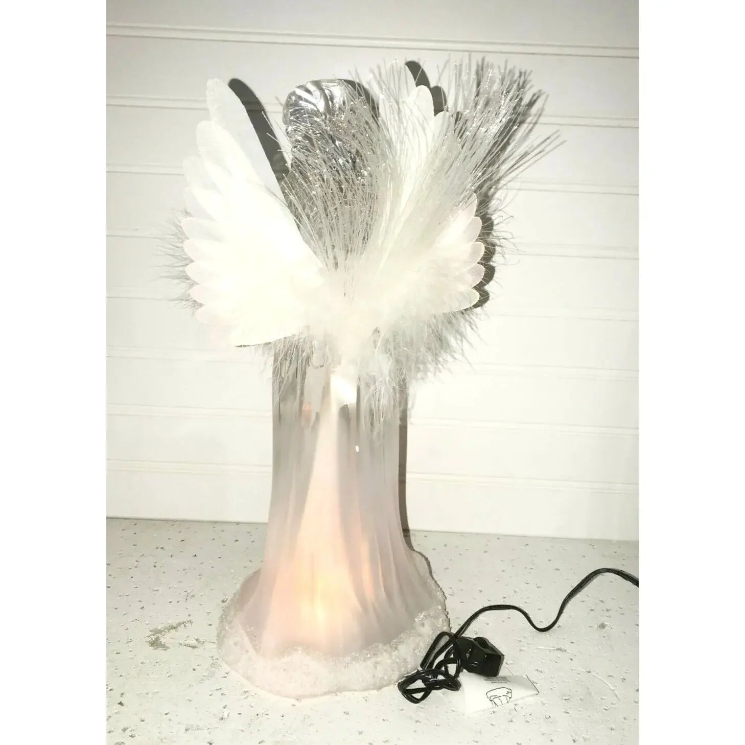 Lighted angel table decor with feather wings, glowing body, and fiber optic accents