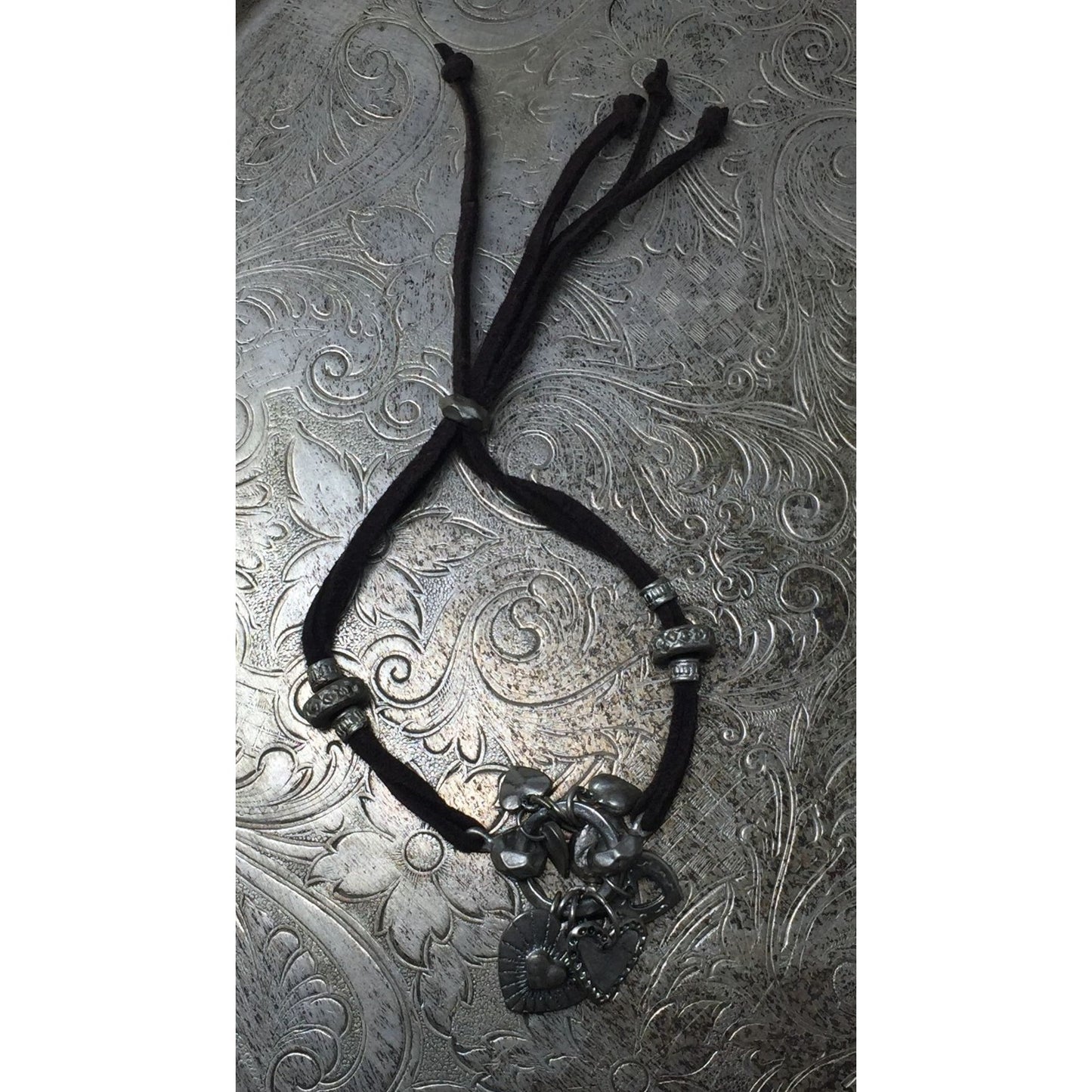 Adjustable Women's Bracelet with Heart Charms on it