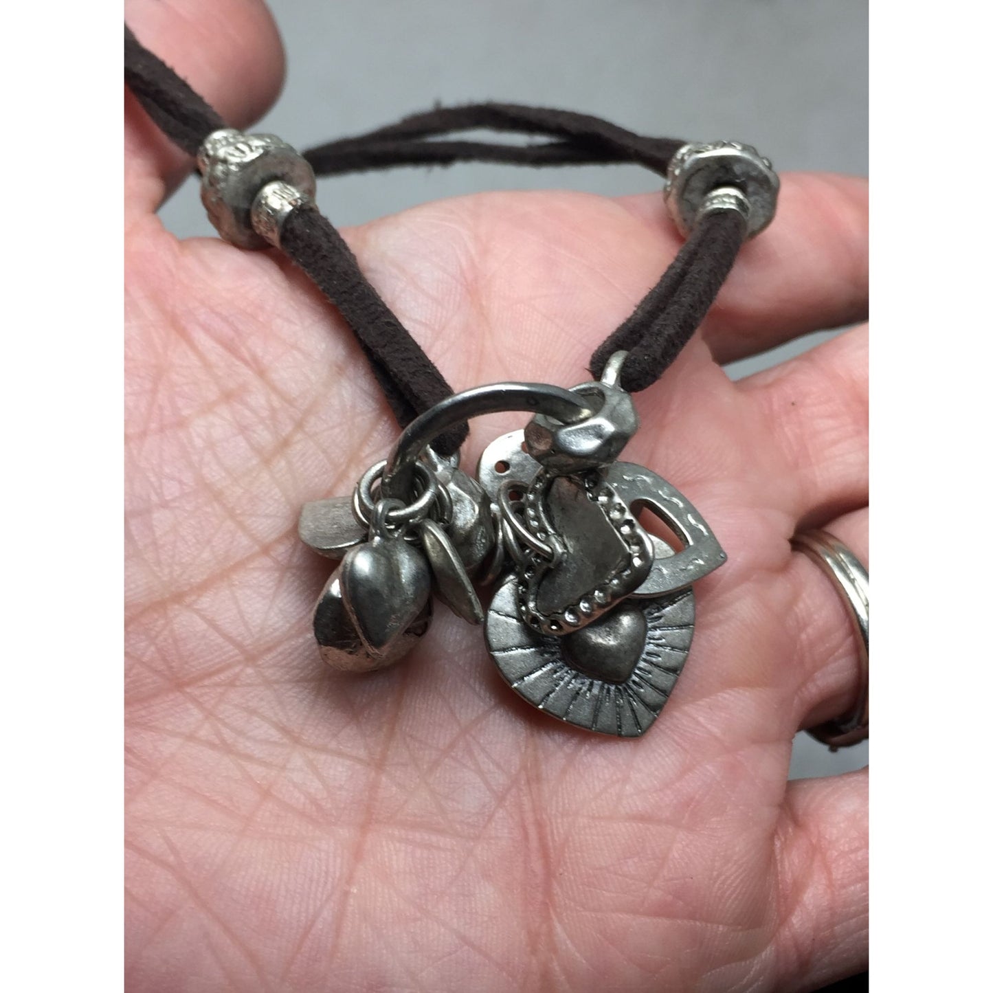Adjustable Women's Bracelet with Heart Charms on it