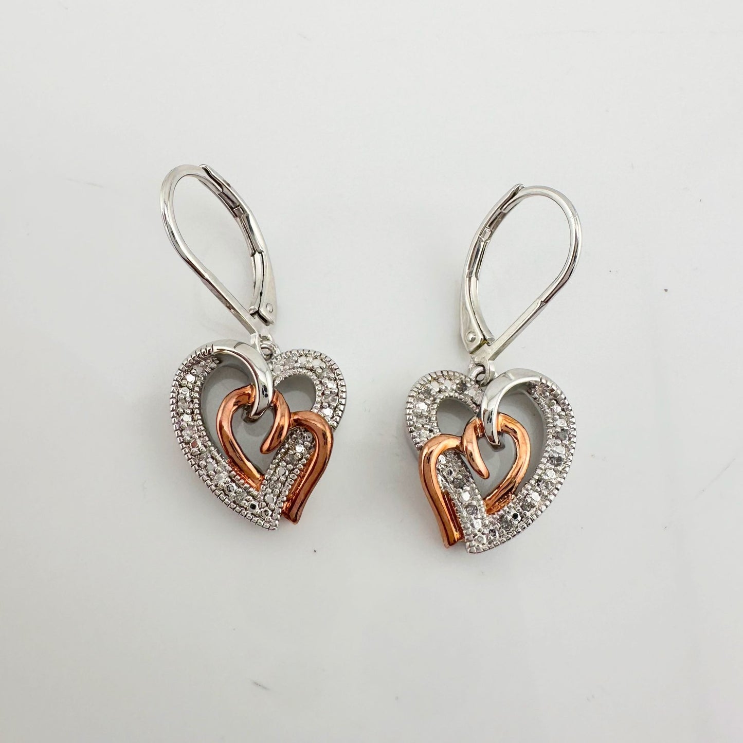 Two Tone Interlocking Hearts Diamond Accent Earrings