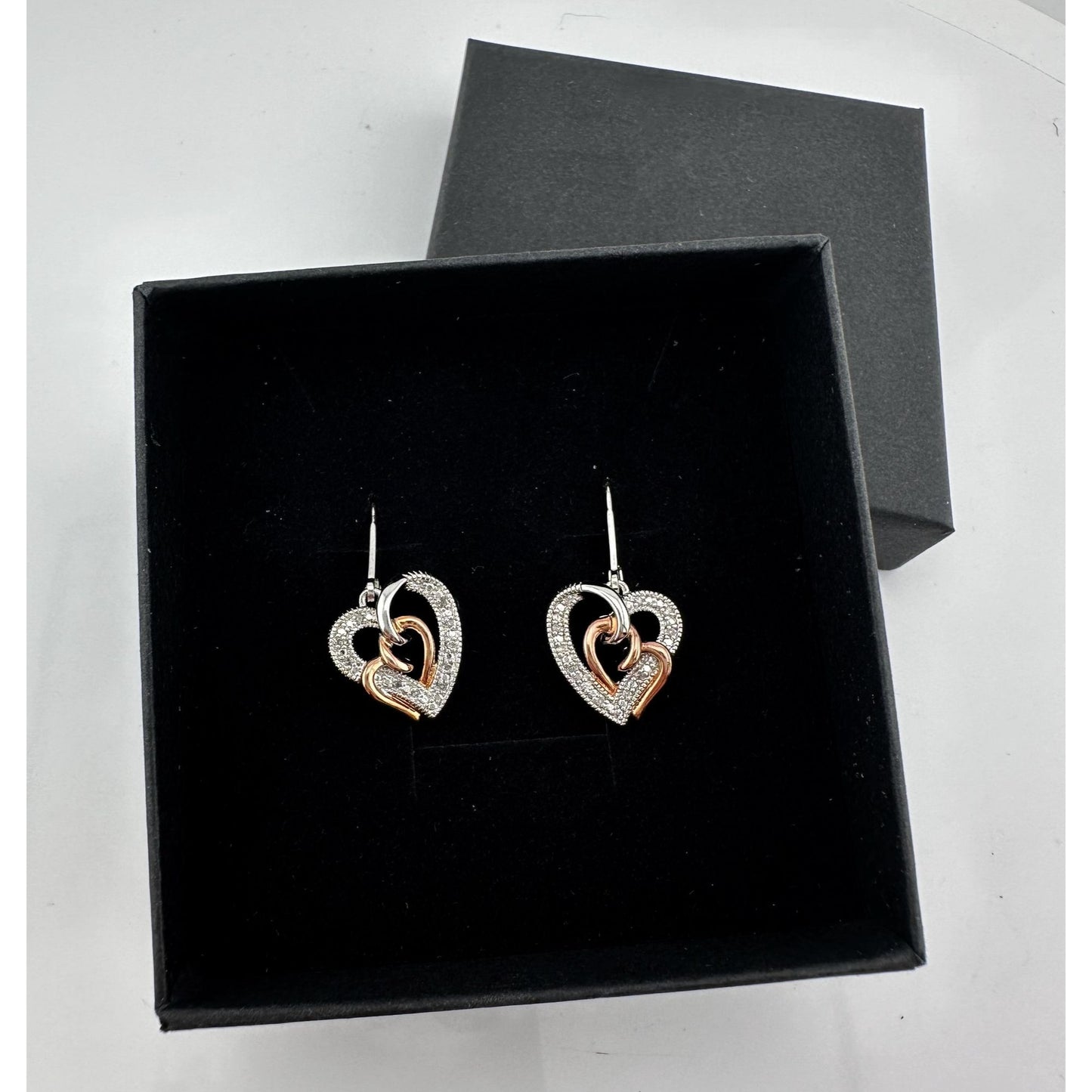 Two Tone Interlocking Hearts Diamond Accent Earrings