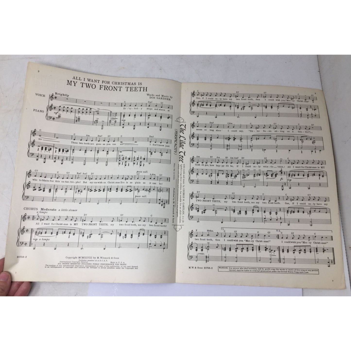 vintage sheet music for the holiday classic "(All I Want for Christmas) Is My Two Front Teeth". A+ Stuff  A+ Stuff SHEET MUSIC