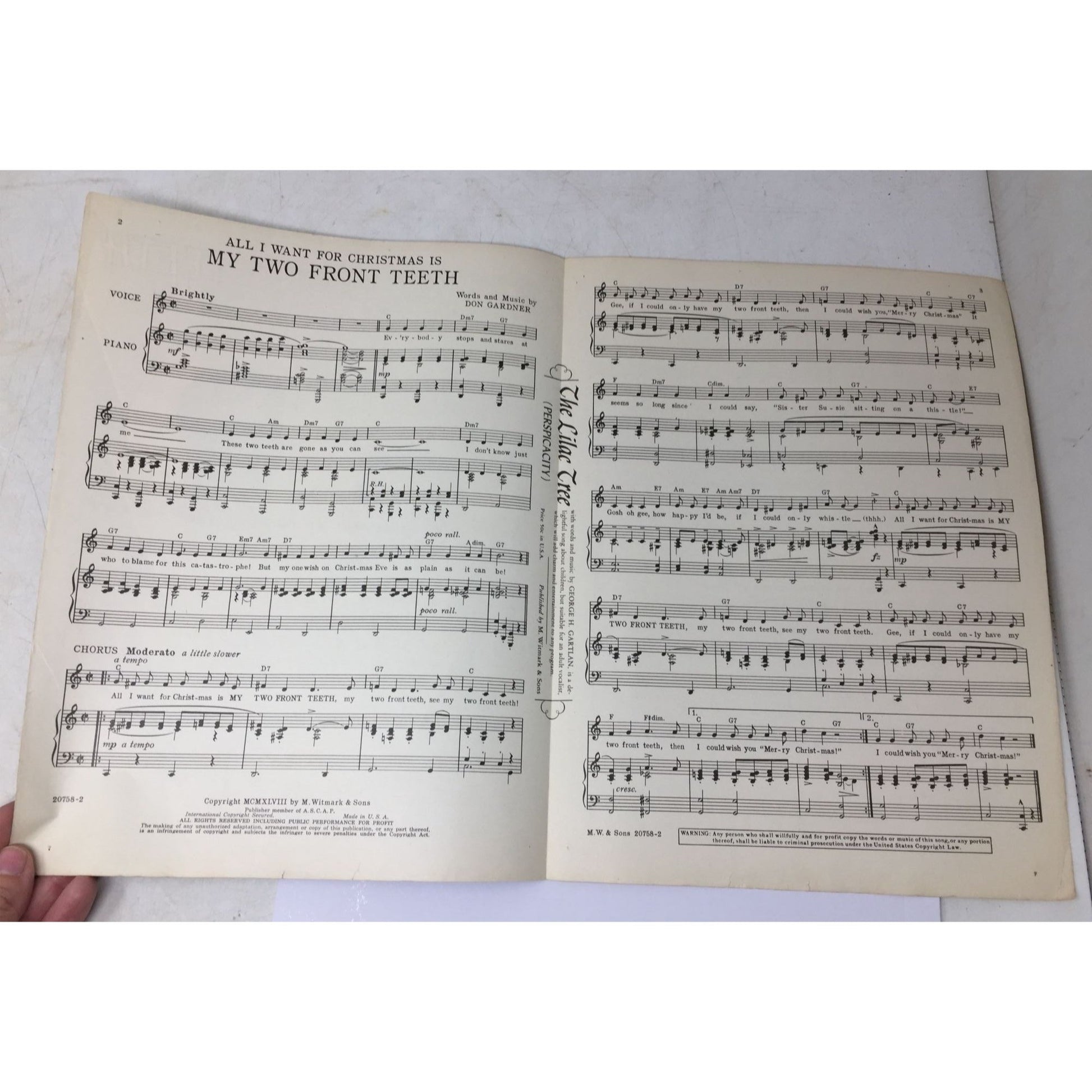 vintage sheet music for the holiday classic "(All I Want for Christmas) Is My Two Front Teeth". A+ Stuff  A+ Stuff SHEET MUSIC