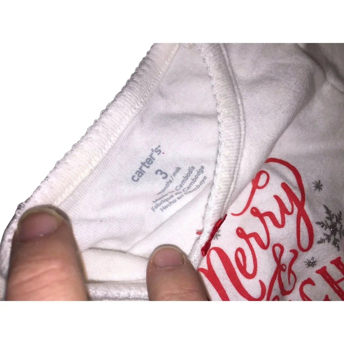 White toddler shirt size 3T with festive red print and visible inner label