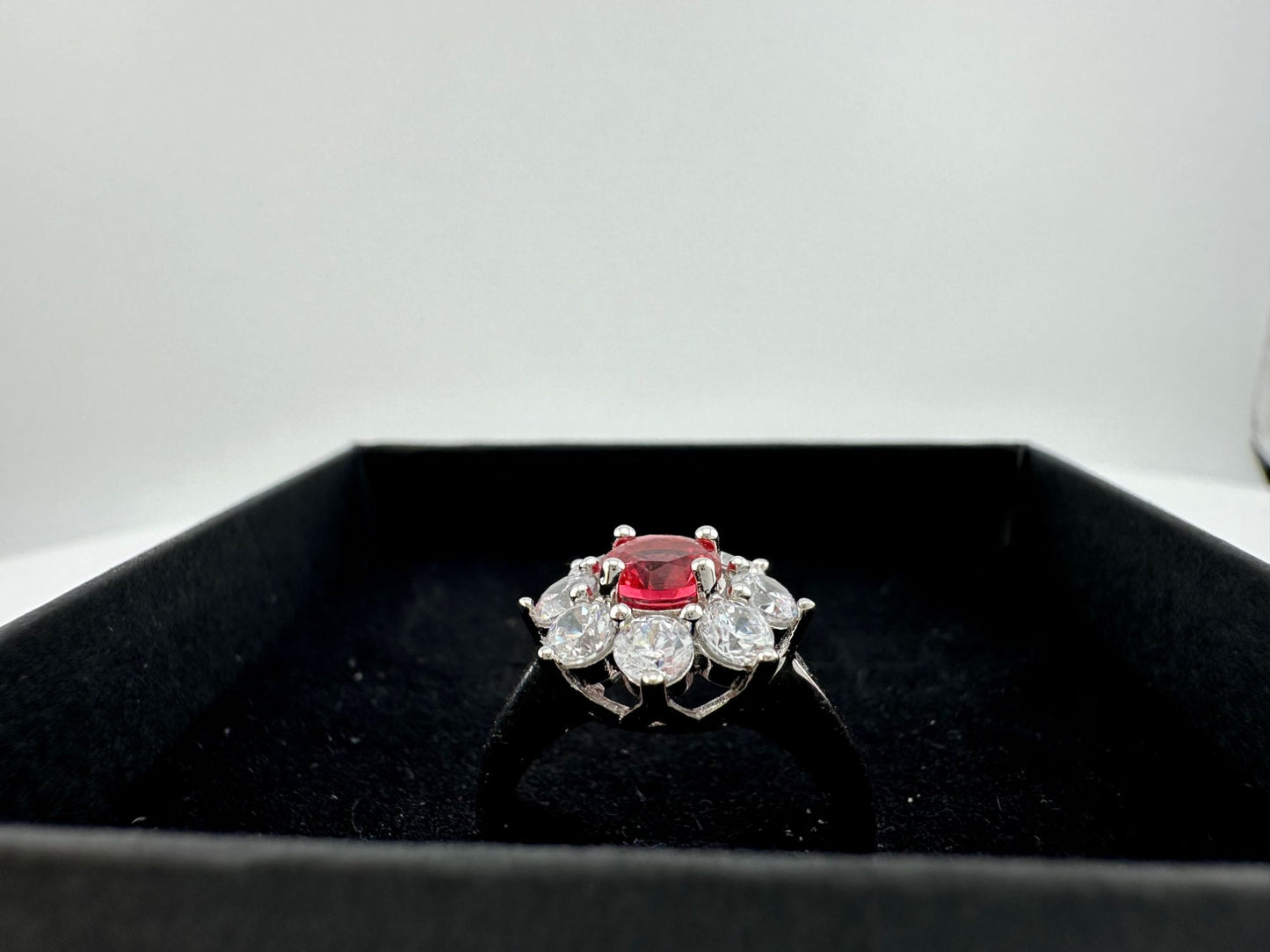 Beautiful and Bright Lab Created Ruby and White Topaz Flower Burst Ring