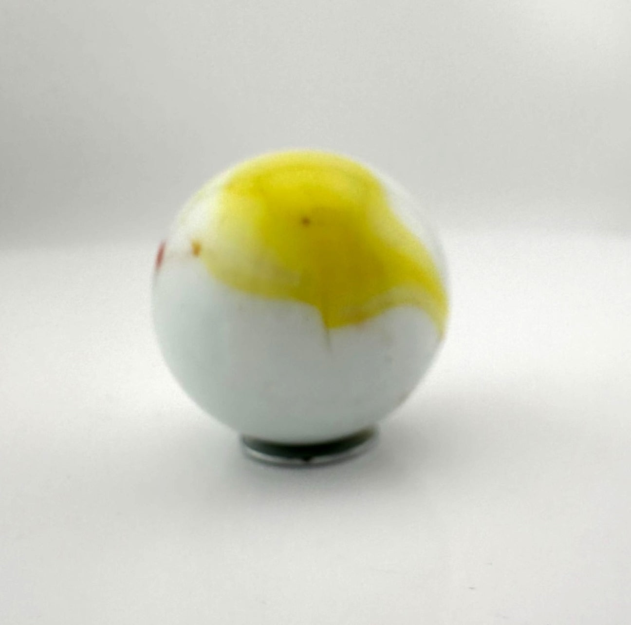 Vintage Opaque White Glass Shooter Marble with Yellow Smudge and Reddish Orange  Line