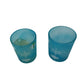 Two Small Blue Tea Light Candle Holders with Snowflake Print on them