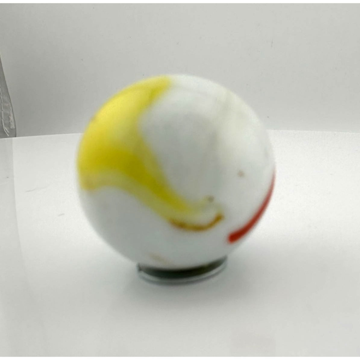 Vintage Opaque White Glass Shooter Marble with Yellow Smudge and Reddish Orange  Line