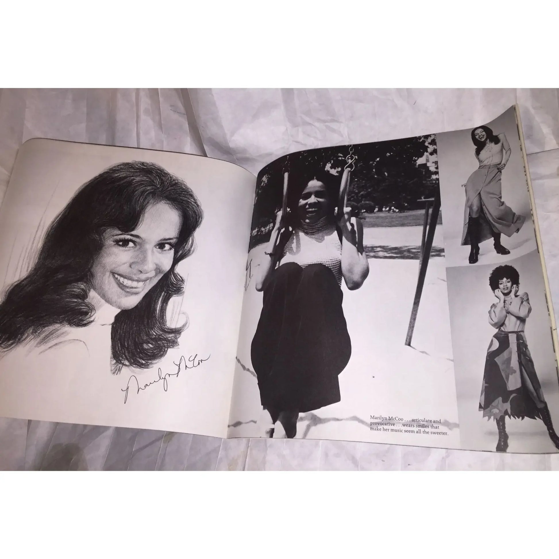 Open book with black and white portraits and candid photos of women, retro style photography.