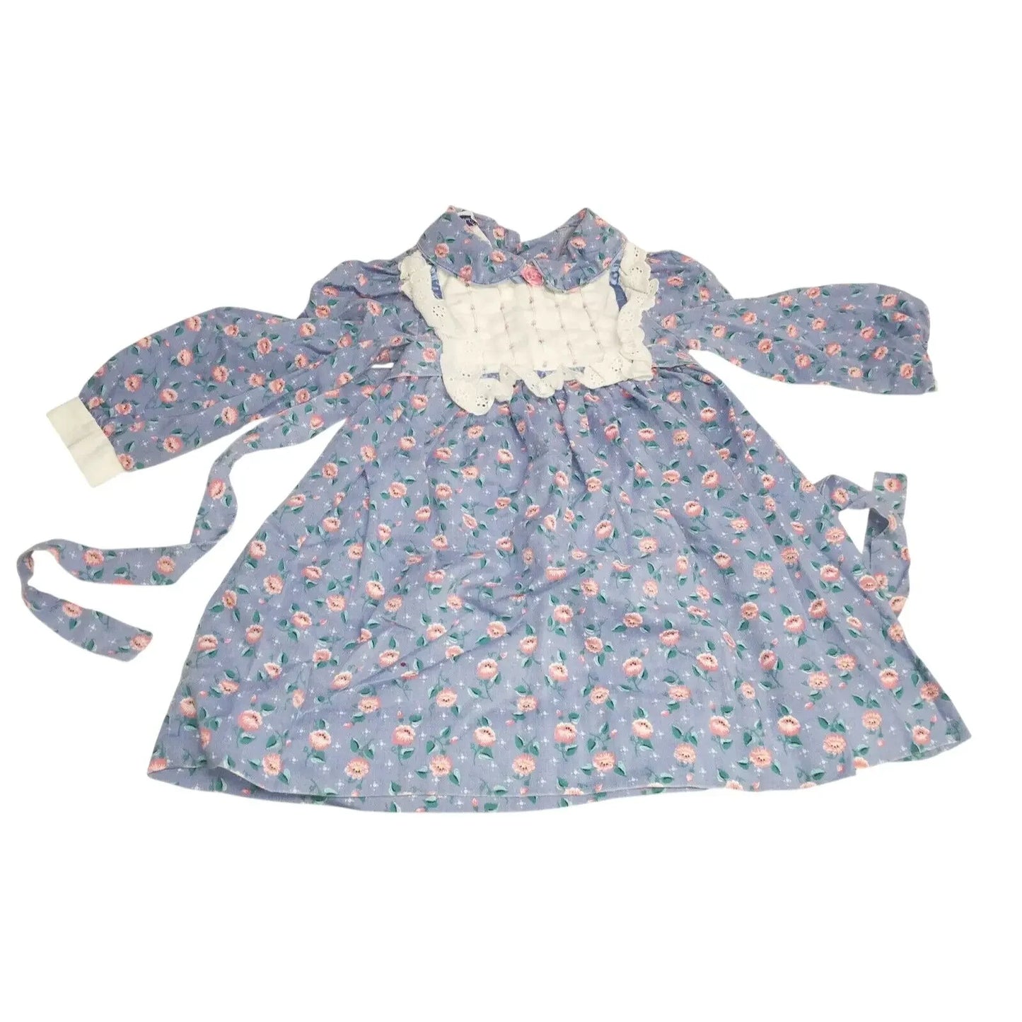 Purple floral long sleeve dress with white lace bib and cuffs, vintage-inspired design