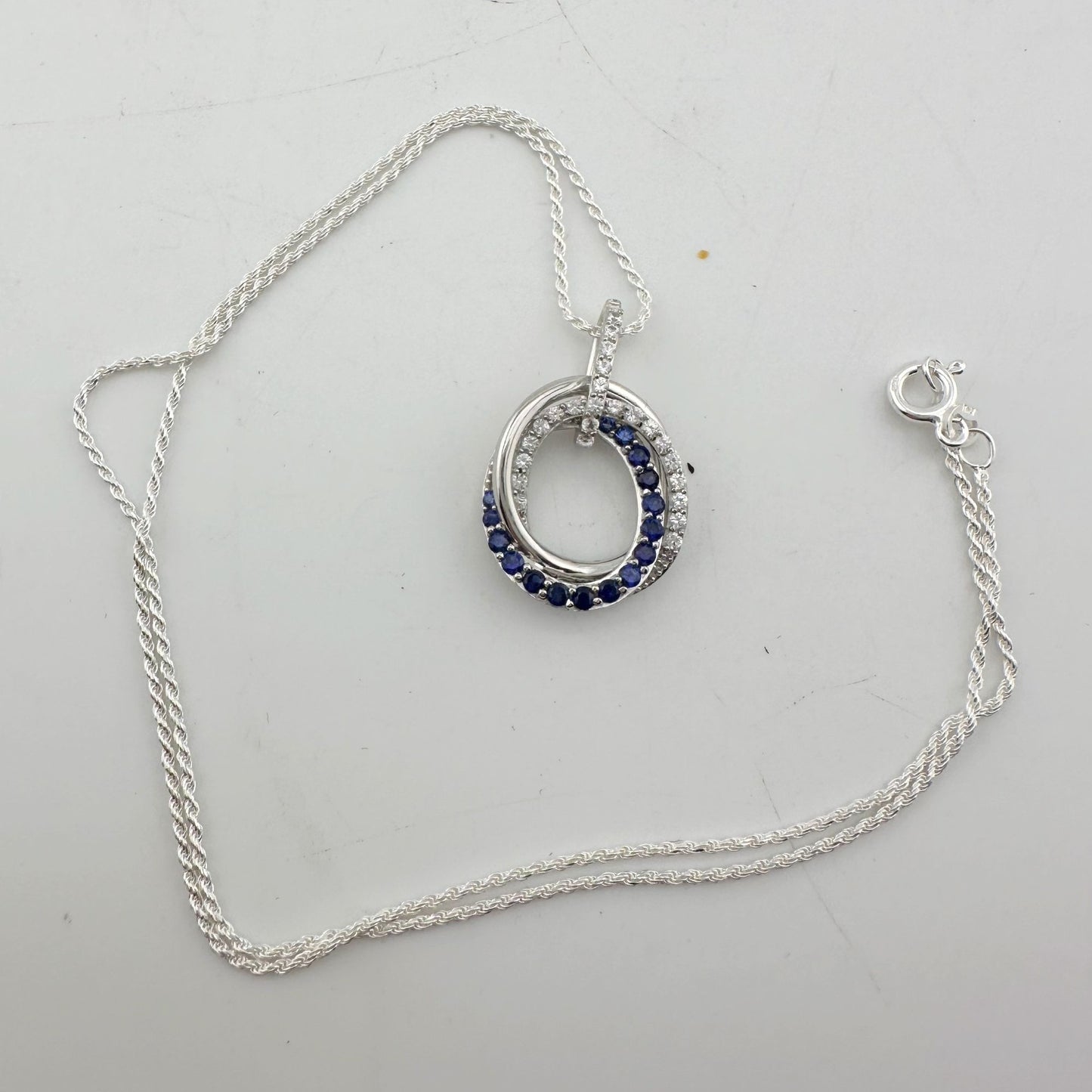 Blue and White Sapphire (Lab Created) Interlocking Loops Pendant with Necklace