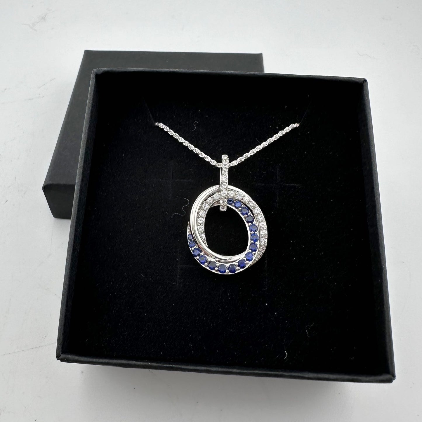 Blue and White Sapphire (Lab Created) Interlocking Loops Pendant with Necklace